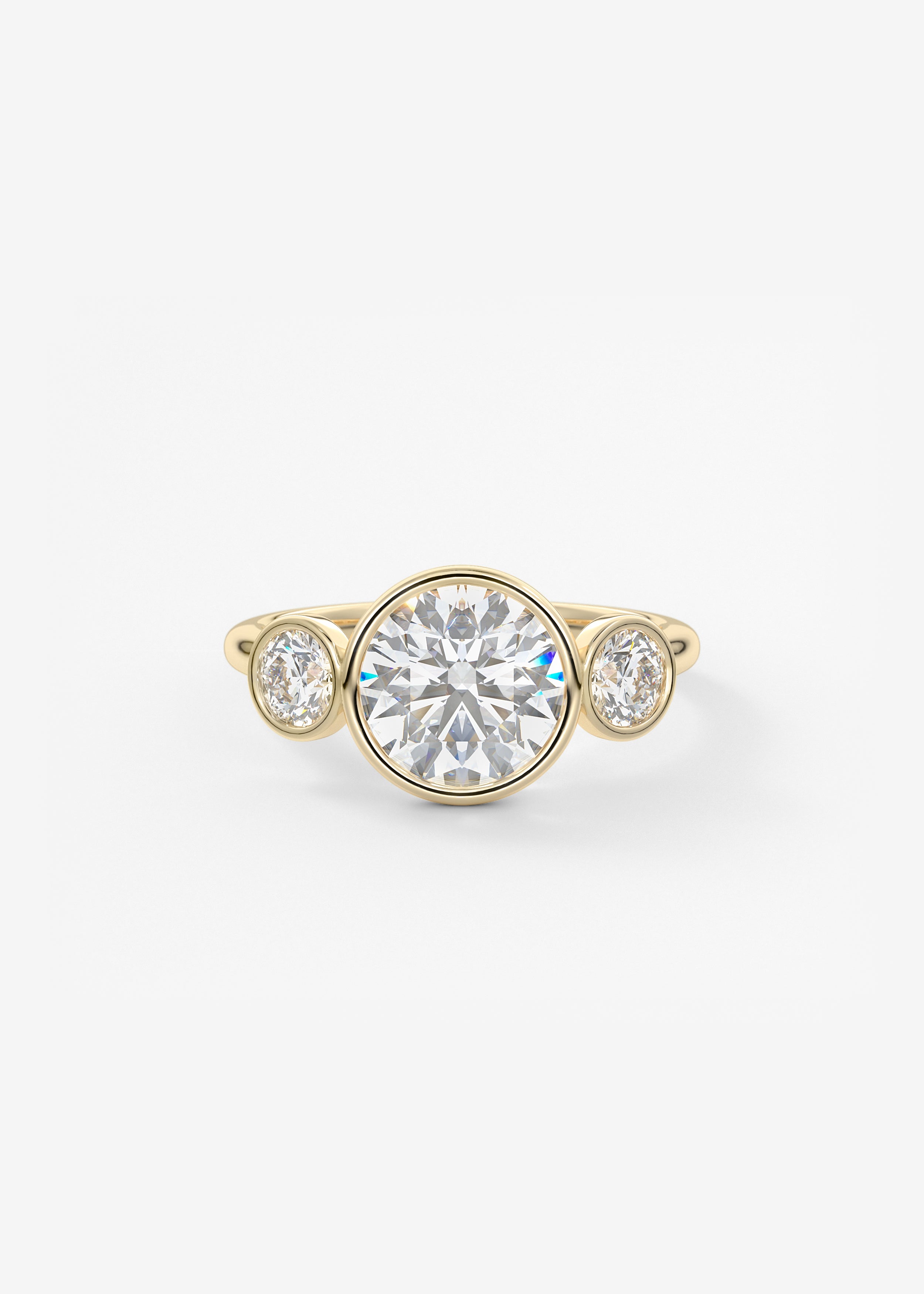 The Triple Bezel  engagement in YG metal featuring Round cut with Three Stone,Bezel setting