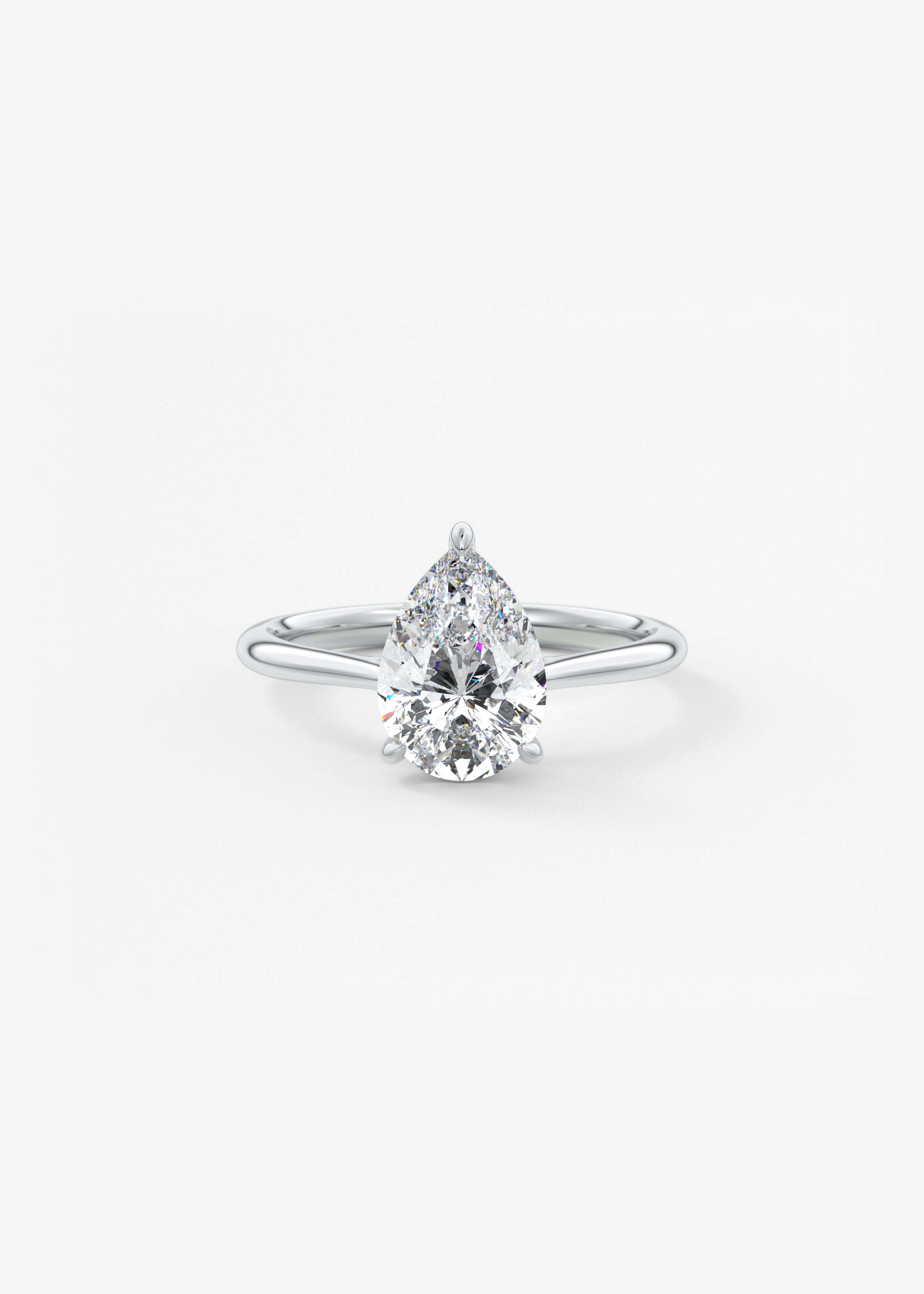The Cathedral Hidden Halo engagement in WG metal featuring Pear cut with Solitaire,Prong,Hidden Halo,Cathedral setting