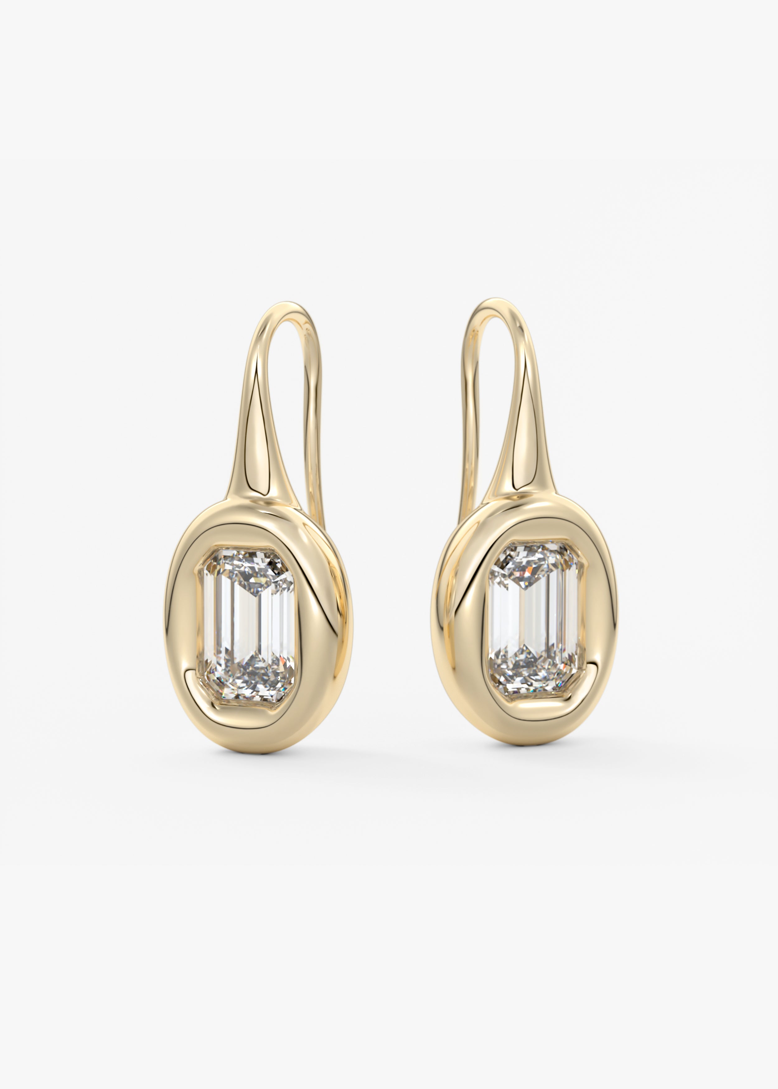The Gumdrop stud in YG metal featuring Emerald cut with Bezel setting