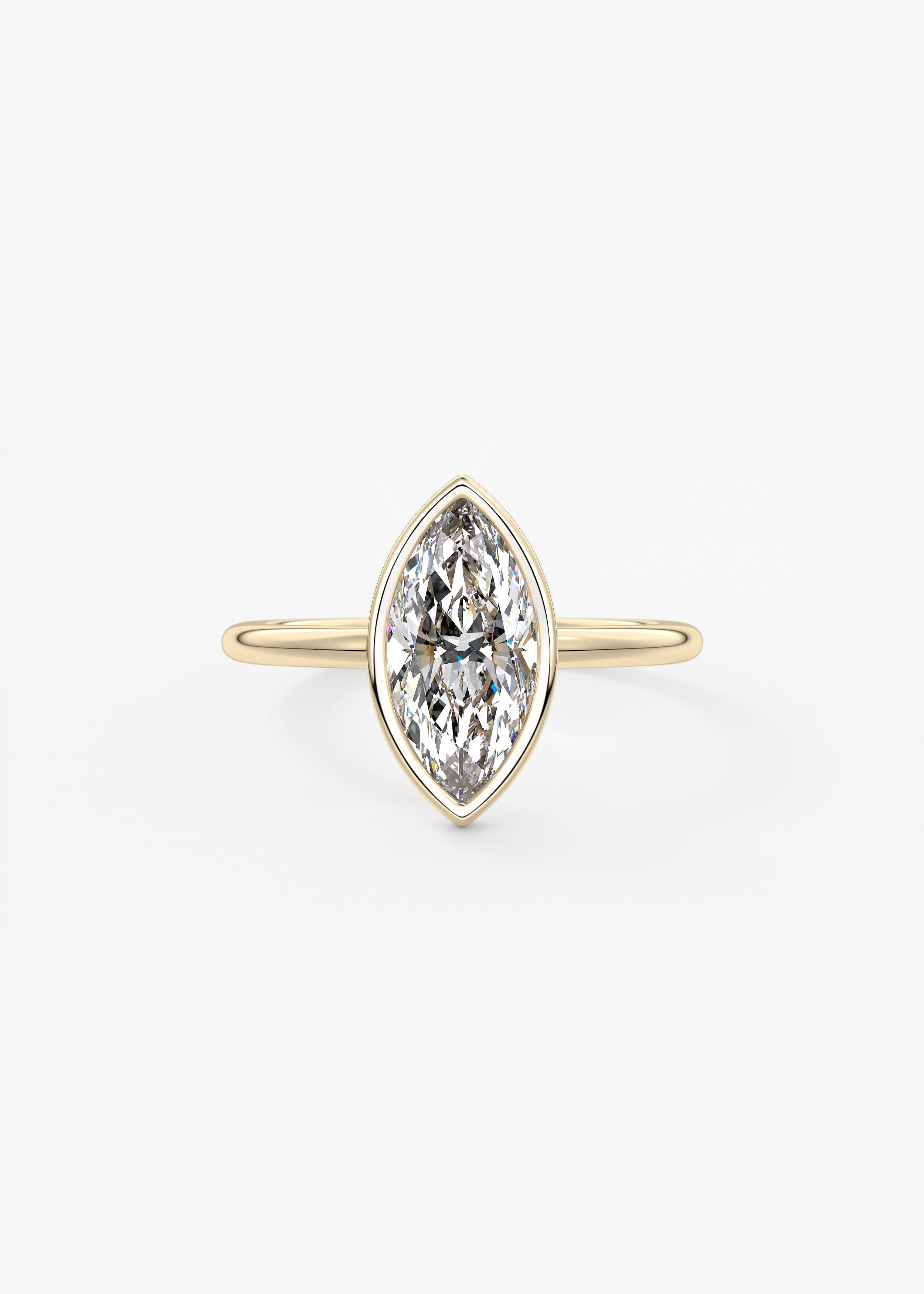 The Daily Bezel engagement in YG metal featuring Marquise cut with Solitaire,Bezel setting
