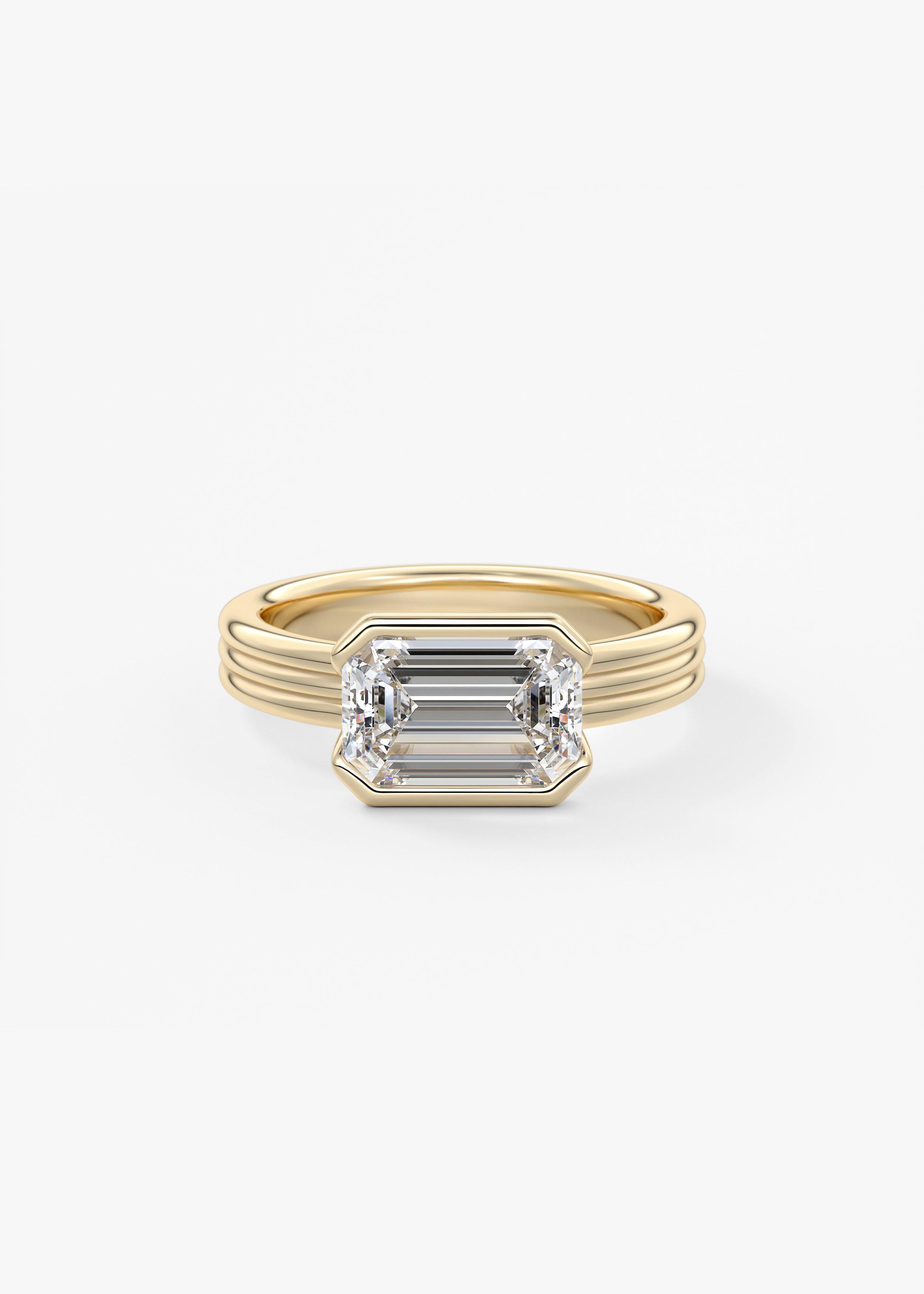 The Echo Half Bezel  engagement in YG metal featuring Emerald cut with Solitaire,Chunky setting
