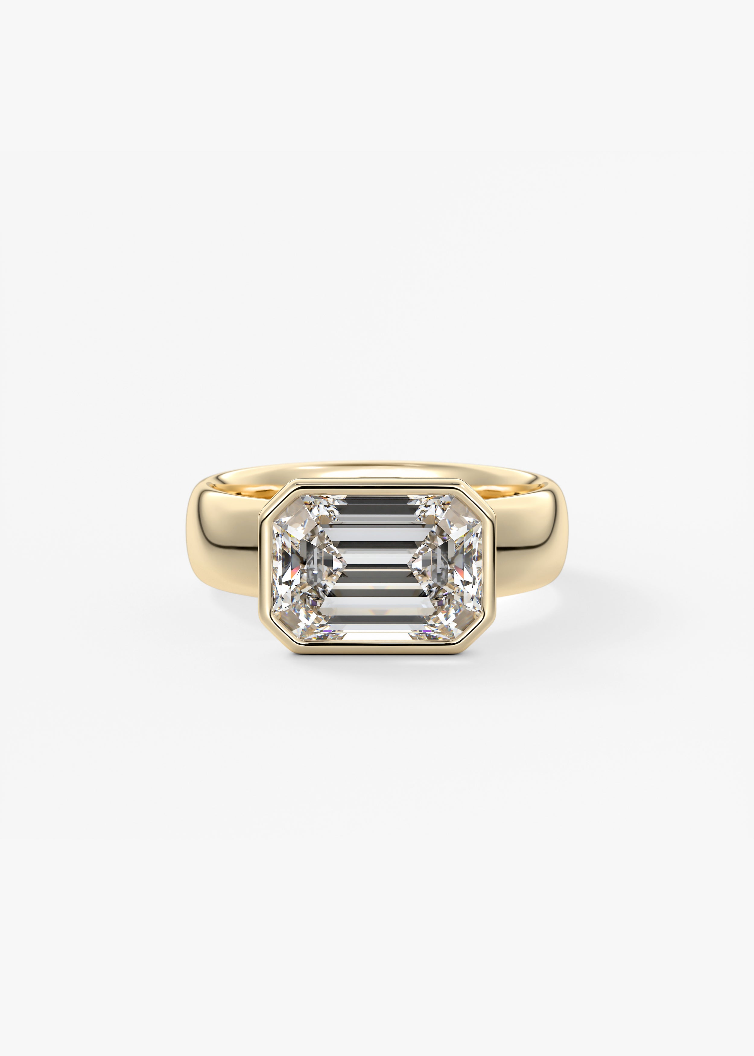 The Daily Bezel XL  engagement in YG metal featuring Emerald cut with Solitaire,Bezel setting