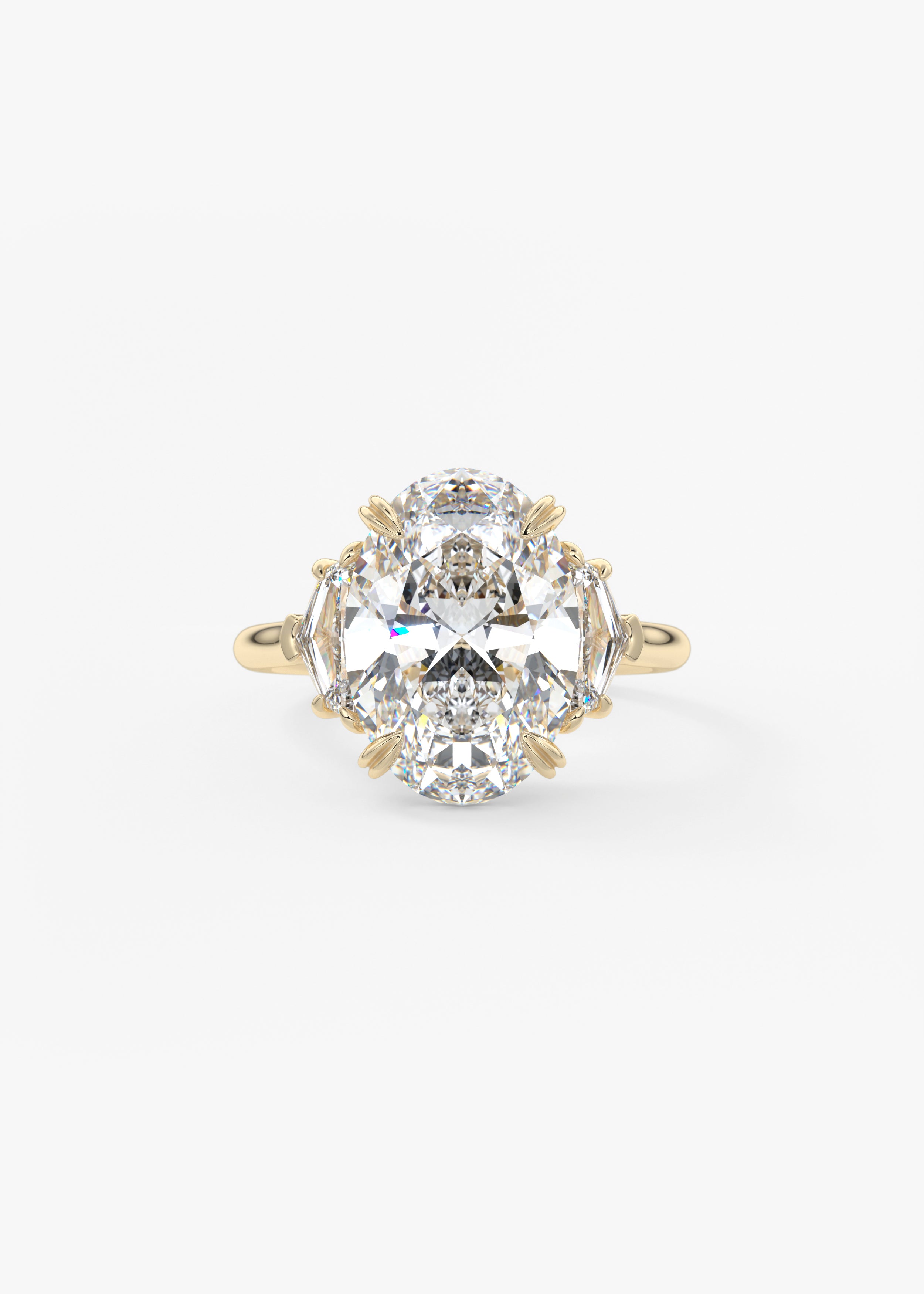 The Marguerite  engagement in YG metal featuring Oval cut with Prong,Three Stone setting