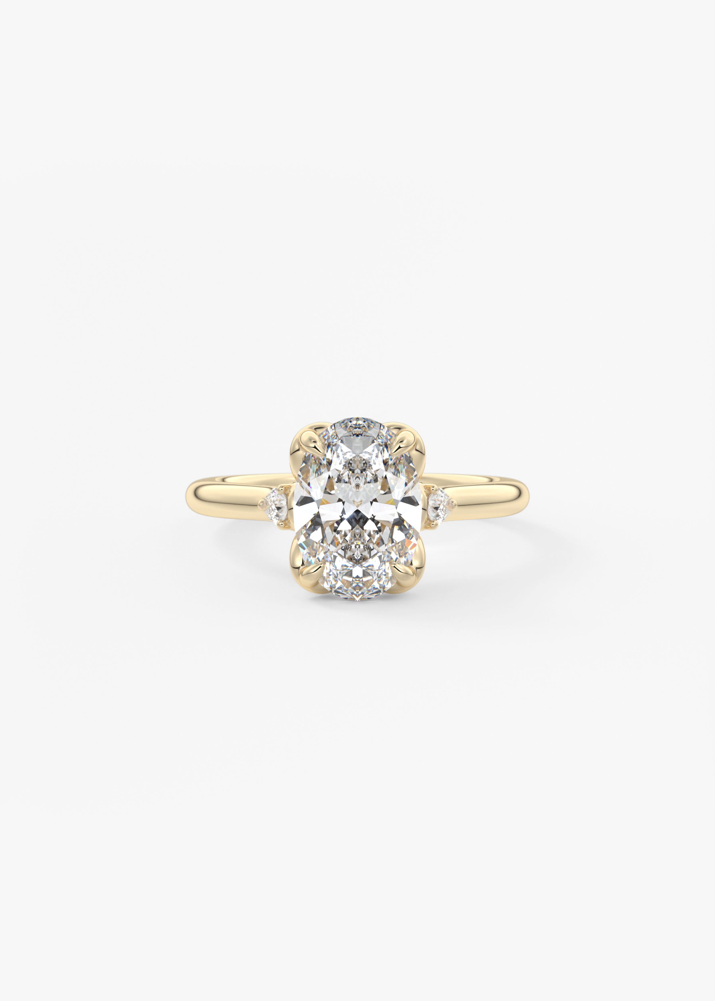 The Buttercup Bouquet engagement in YG metal featuring Oval cut with Prong,Three Stone setting