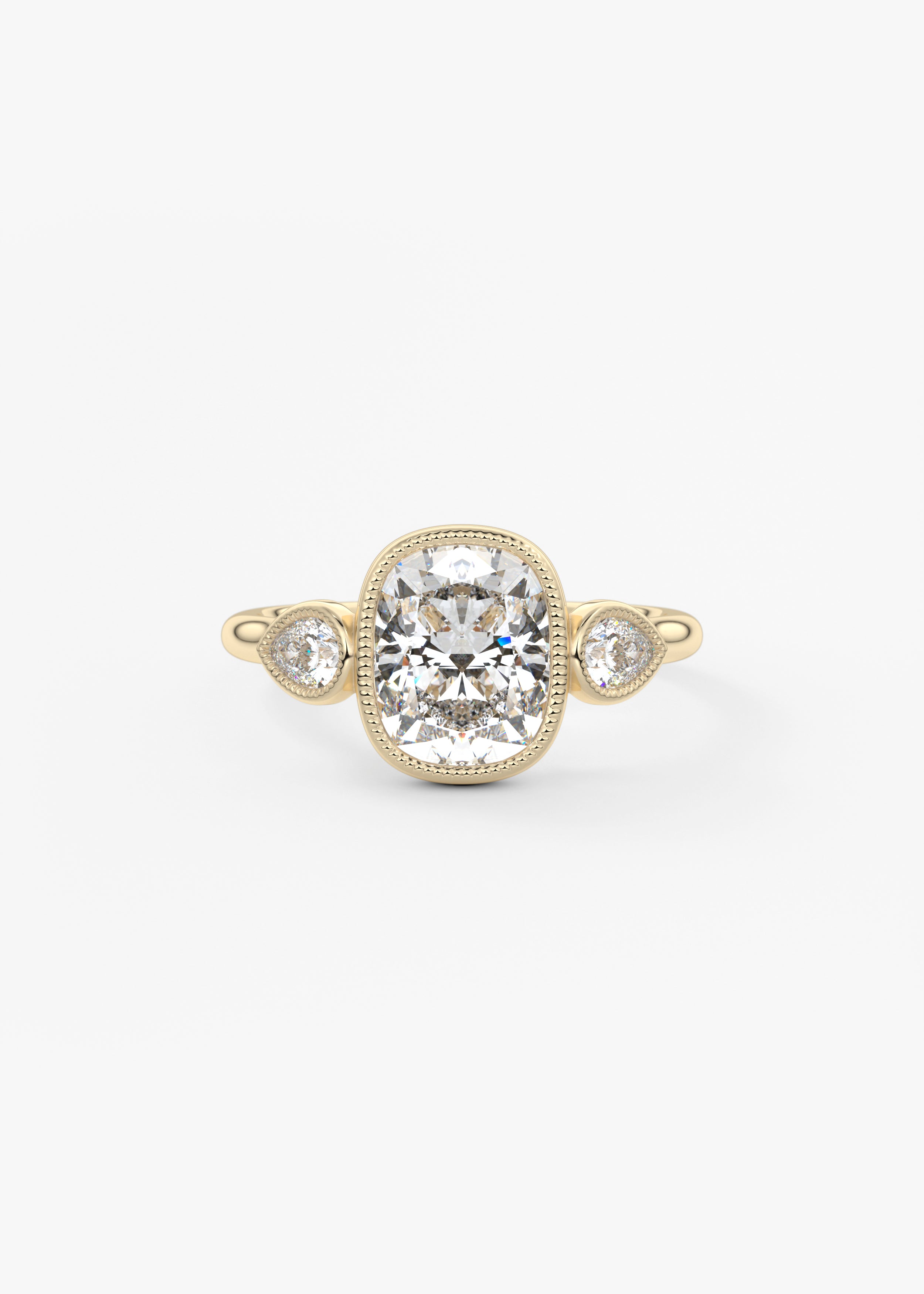 The Millie Three Stone  engagement in YG metal featuring Elongated Cushion,Cushion,Old Mine, cut with Three Stone,Bezel,Vintage Inspired setting
