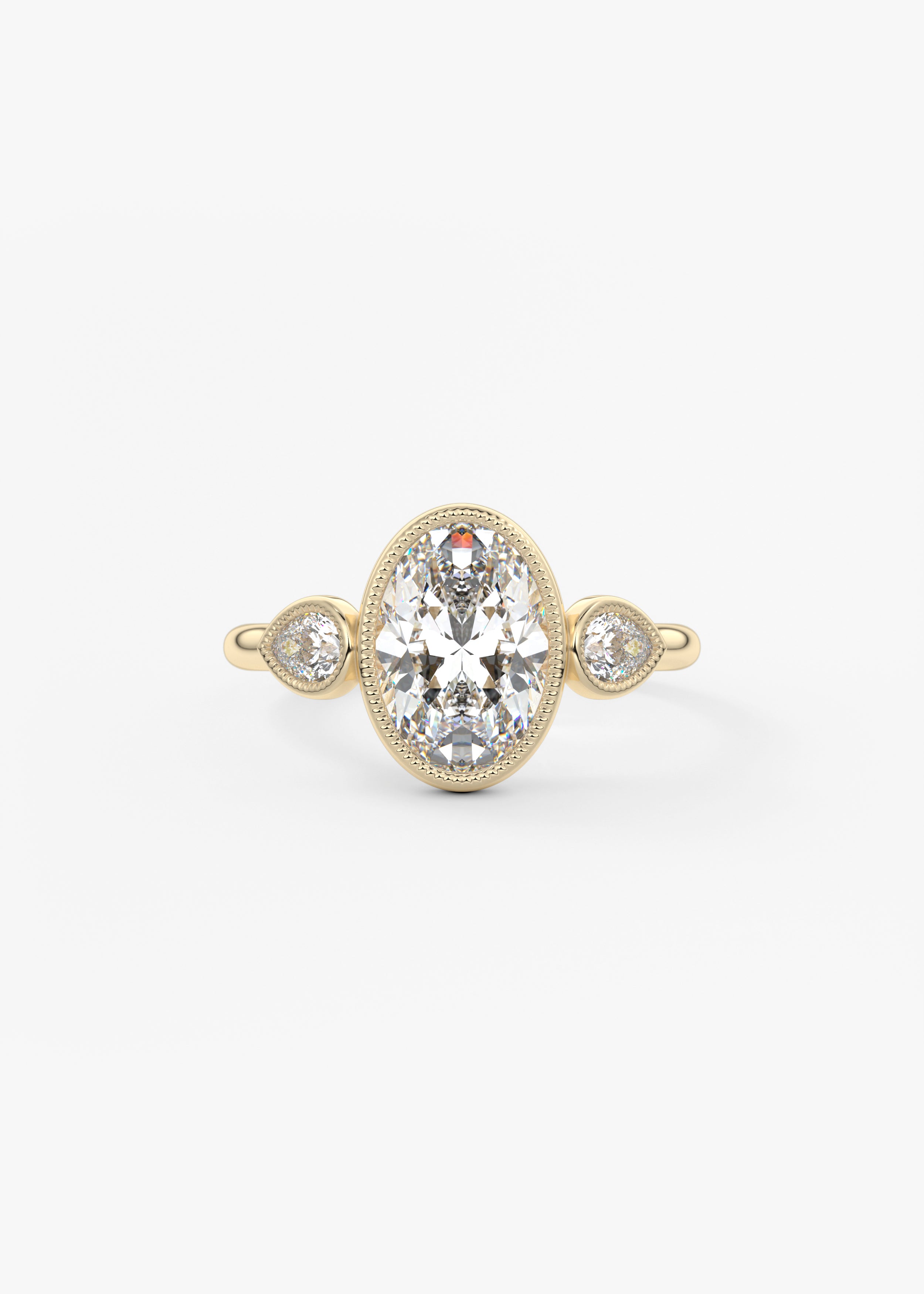 The Millie Three Stone engagement in YG metal featuring Oval cut with Three Stone,Bezel,Vintage Inspired setting