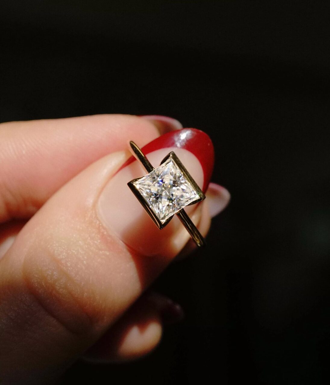 A half bezel set princess cut diamond 