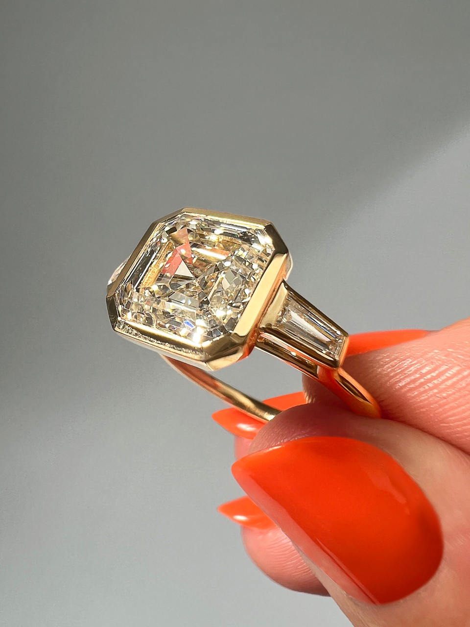 asscher cut bezel three stone setting