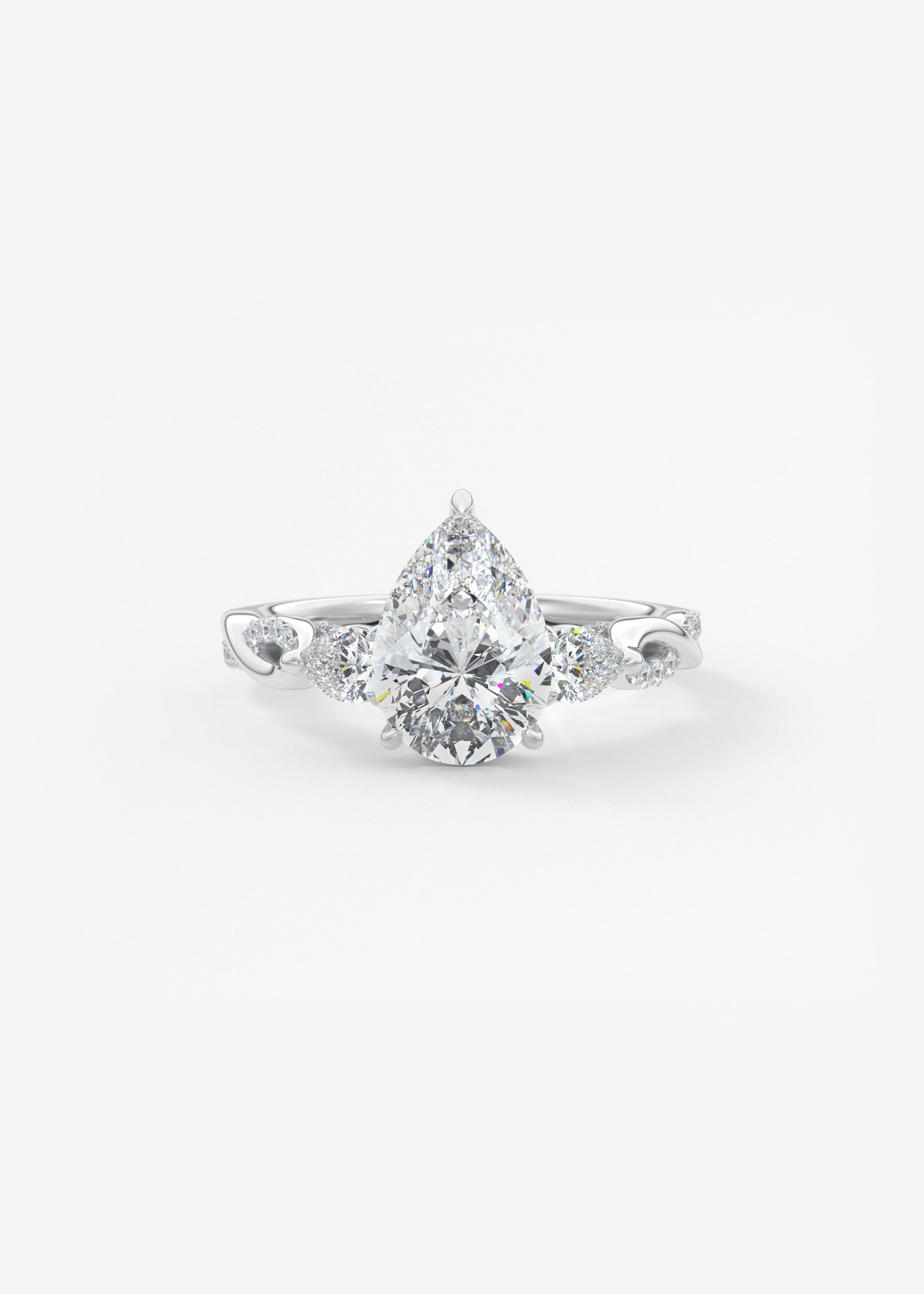 The Full Bloom engagement in WG metal featuring Pear cut with Three Stone,Prong,Pave,Hidden Halo,Vintage Inspired,Split Shank,Nature Inspired setting