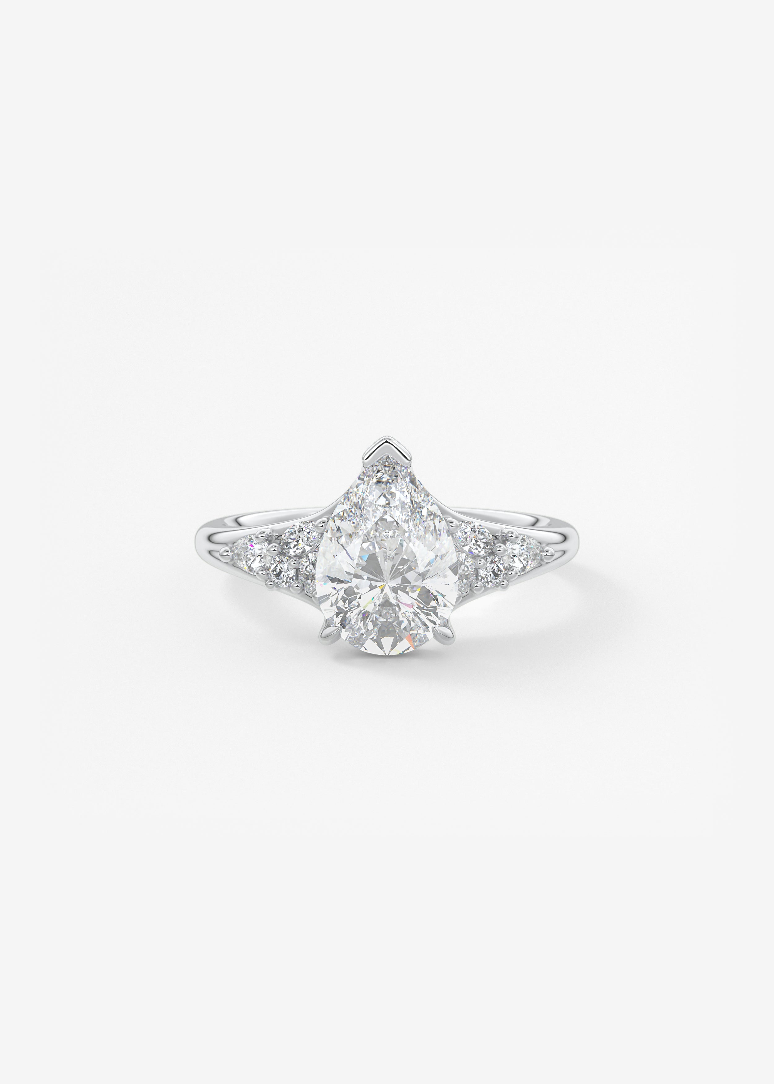 The Posie engagement in WG metal featuring Pear cut with Cluster,Prong,Diamond Details,Vintage Inspired,Split Shank,Nature Inspired setting