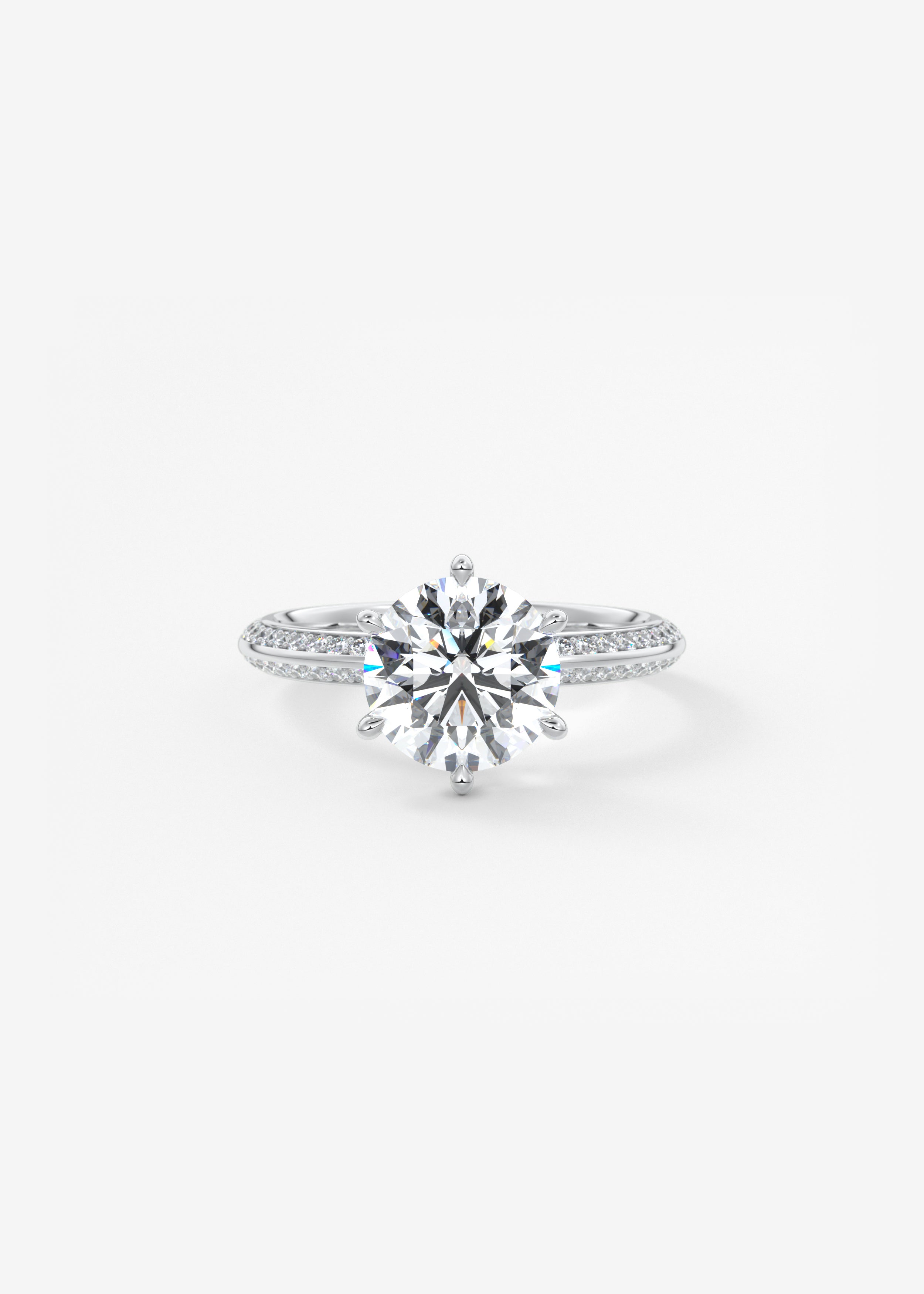 Harper Butterknife Pavé  engagement in WG metal featuring Round cut with Prong,Pave setting