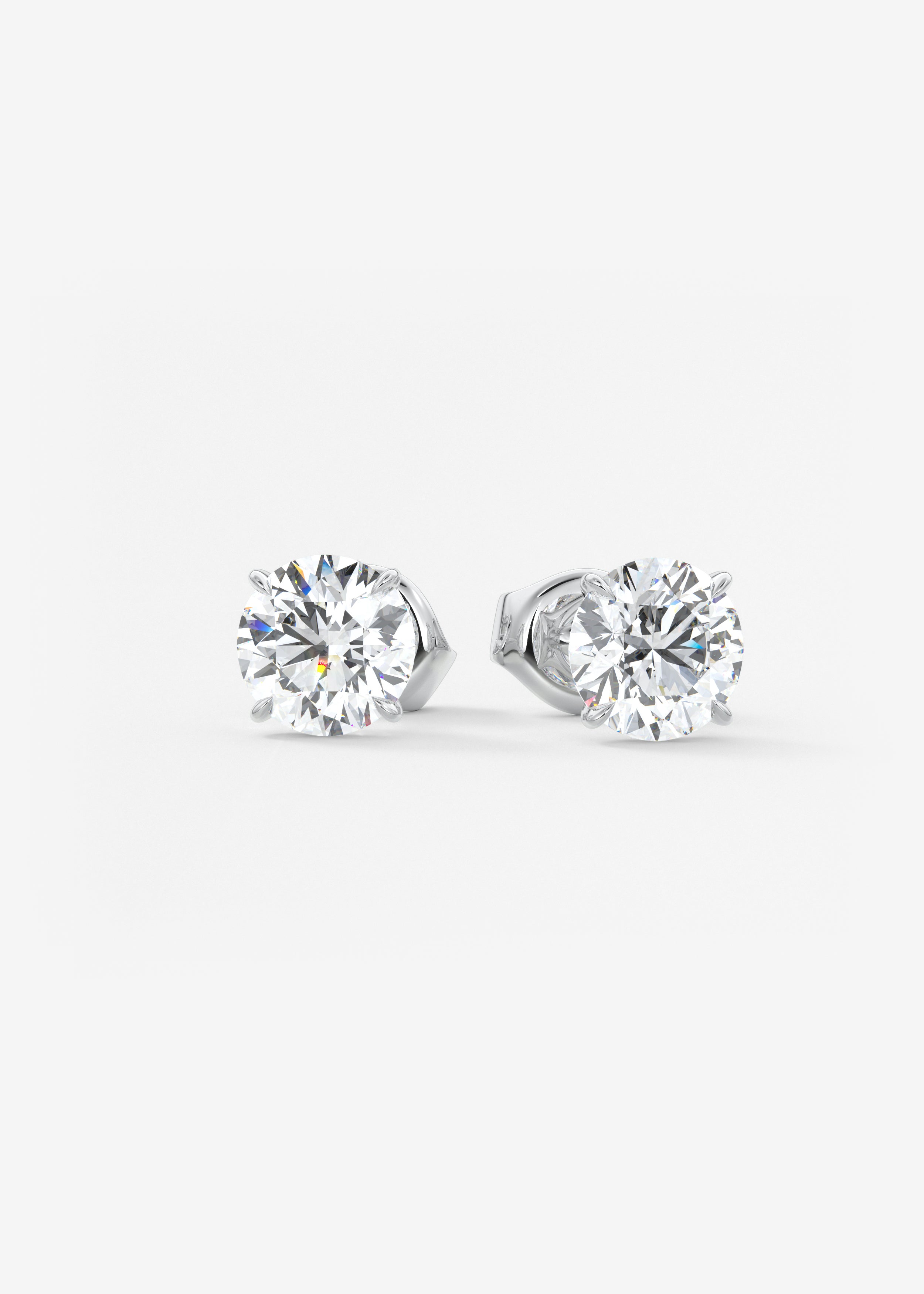 Single Scoop  stud in WG metal featuring Round,Round Brilliant cut with Prong,Solitaire setting