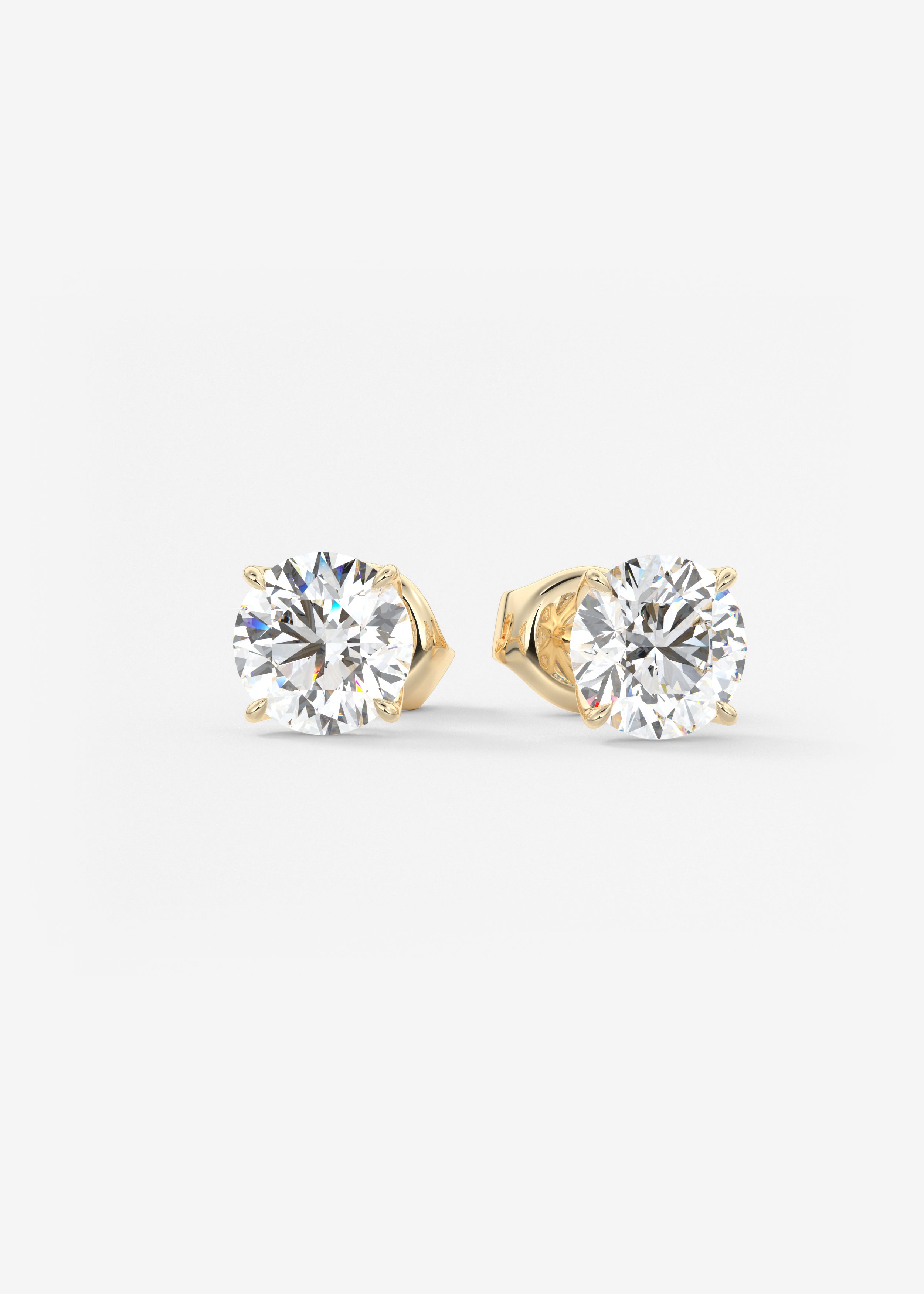 The Royale  stud in YG metal featuring Round,Round Brilliant cut with Prong,Solitaire setting