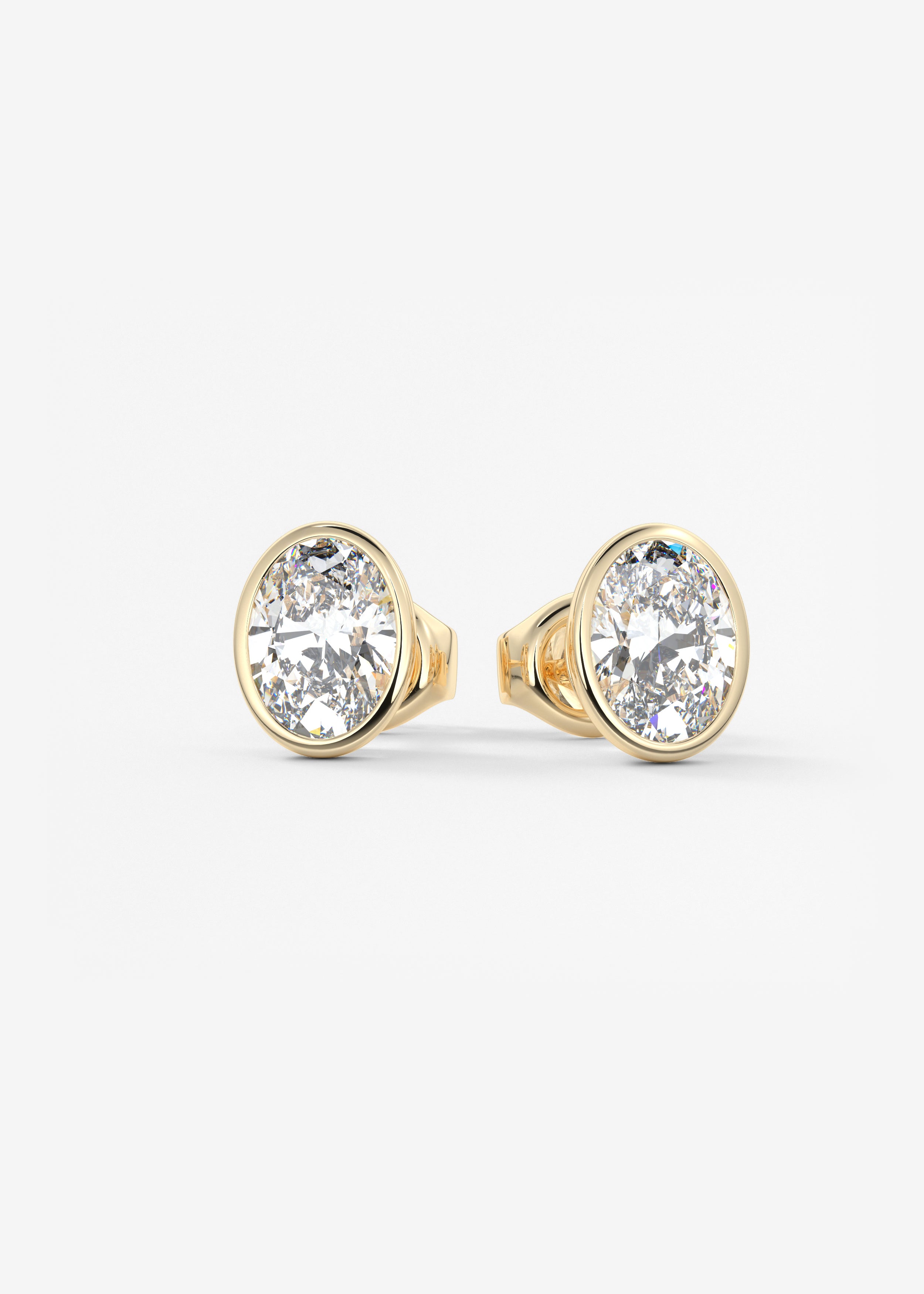 The Lowrider  stud in YG metal featuring Round,Round Brilliant cut with Bezel,Solitaire setting